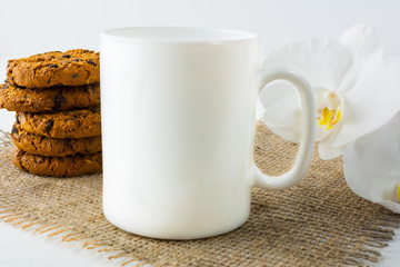 Coffee mug mockup with cookies