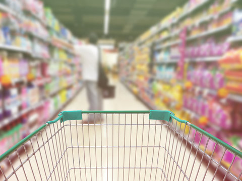 Supermarket blurred background customer with pet food Product sh