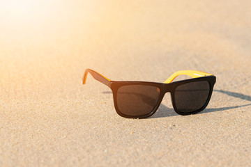 Sun glass on beach.