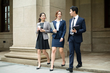 Business people walking at outdoor together