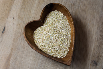 groats in a wooden bowl