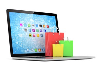 laptop and  shopping pags on white background. 3d rendering.