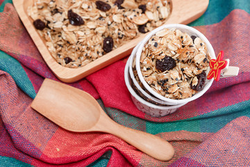 Healthy breakfast. Fresh granola in wooden plate