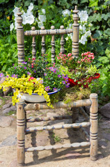 Garden decoration with a old chair.