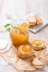 Fresh fruity juicy jam with figs in a jar with crackers and cottage cheese for breakfast, closeup