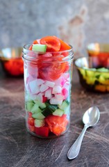 Fresh vegetables salad in a jar