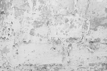 Wall fragment with scratches and cracks