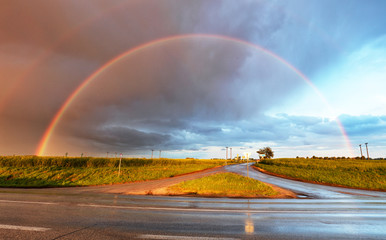 Rainbow over road