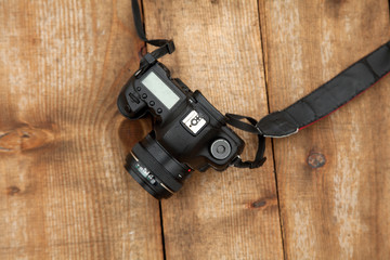 camera lying on the wooden floor