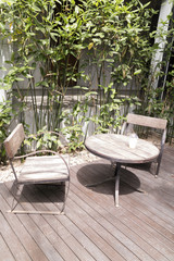 wooden desk and chair on patio