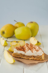 Apple pie with whipped cream covered by grated chocolate