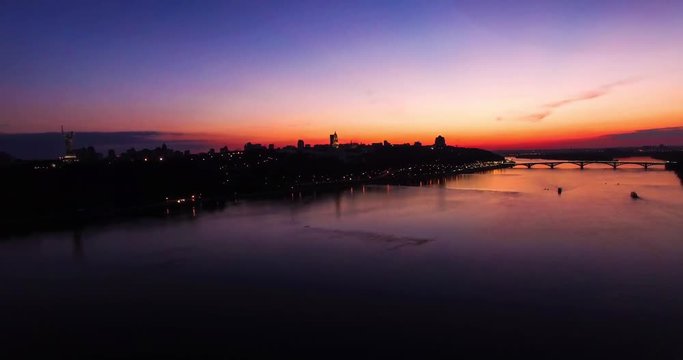 footage of Kiev Pechersk Lavra, Patona Bridge on the Dnieper river, Mother Motherland, lights of urban Kiev at evening. Ukraine, Eastern Europe, romantic.
sunset in a big city