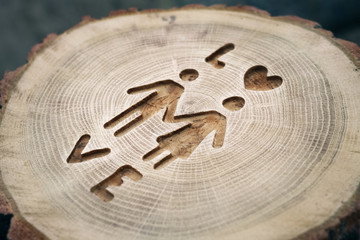 Woodcarving, men and women love. hold hands. Photos for your des
