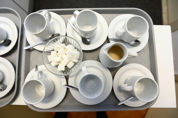 coffee/ coffee cups, milk and Sugar on a tray