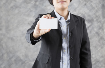 businesswoman hand holding blank business card