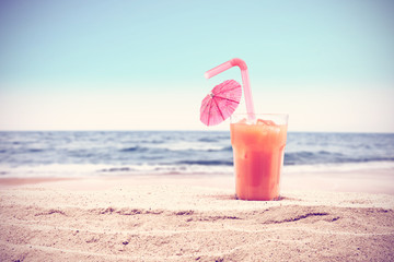 summer background for your drink on sand and free space 