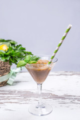 Apple smoothie in a martini glass 