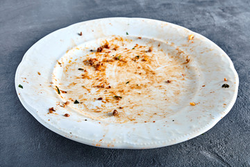 Dirty plate after spaghetti with sauce