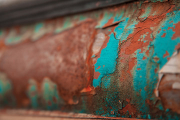 peeling paint on rusty metal