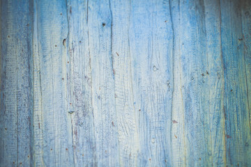 Fototapeta na wymiar Light-blue old wooden fence.