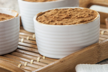 Creamy rice pudding sprinkled with cinnamon