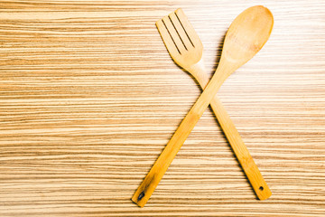 kitchenware on wooden background