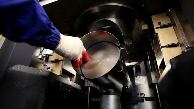 High-tech robotic manufacturing. The process of production a metallic pipes for metal flues and ventilation systems.