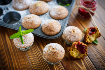 sweet baked muffins with jam inside