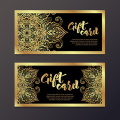 Rich gold gift certificates in the Indian style.