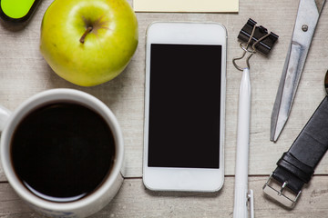 Smartphone and office accessories. Top view. Office live concept.