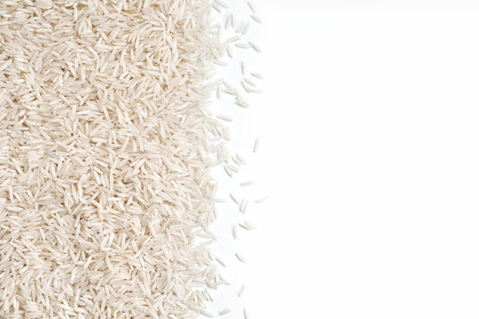 White rice  on white background .  Close up, top view, high resolution product.
