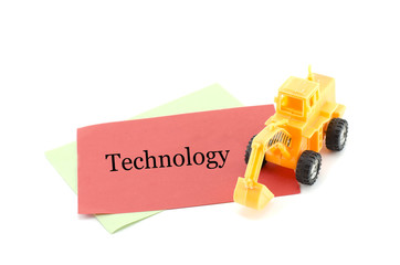 Obraz premium image concept yellow toy bulldozer on red paper and blur word wo