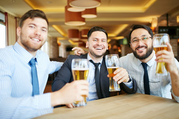 Cheering businessmen