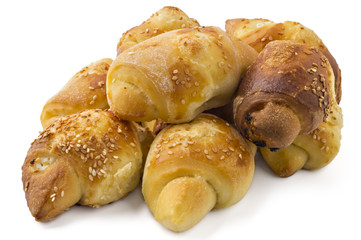 Fresh Serbian pastry rolls with cheese and sesame, kifla, kiflice, isolated on white background