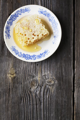 Still life with honey, honeycomb, pollen