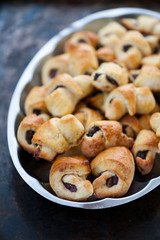 Small croissants on a metal tray