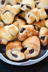 Small croissants on a metal tray