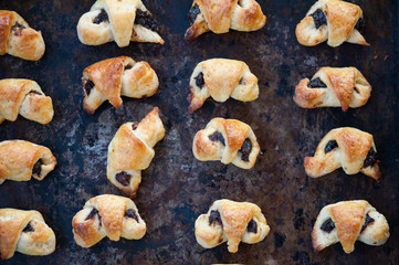 Small croissants on a metal tray