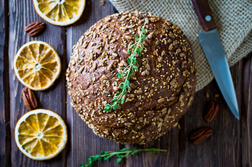 freshly baked multigrain bread on rustic background