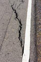 Asphalt broken white line.