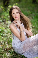 portrait of young woman in the forest