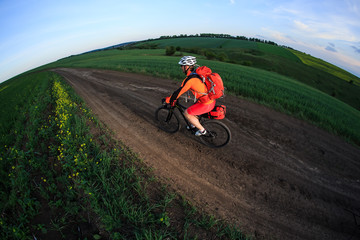 Young man is riding bicycle outside. Healthy Lifestyle.