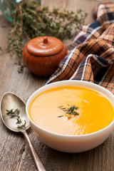 pumpkin soup - puree in a white bowl