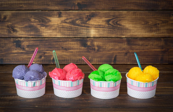Delicious fruit ice sorbet in paper cups