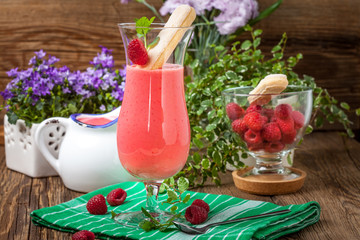 Cocktail with raspberry.