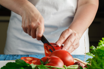 woman cutting vegetables