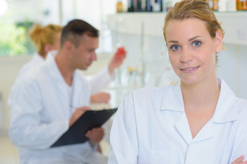 Obraz premium Portrait of female in white coat