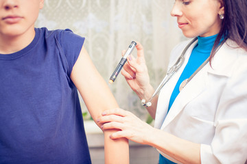 Boy with diabetes during the injections of insulin.