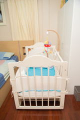 Fototapeta na wymiar Family room with baby bed