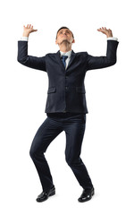 Full length of cut-out businessman pushing invisible wall under pressure